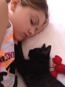 They truly bonded instantly and I became, from this moment on, a huge fan of black cats.  How my then 10-year-old girl saw this early on warms my heart. 