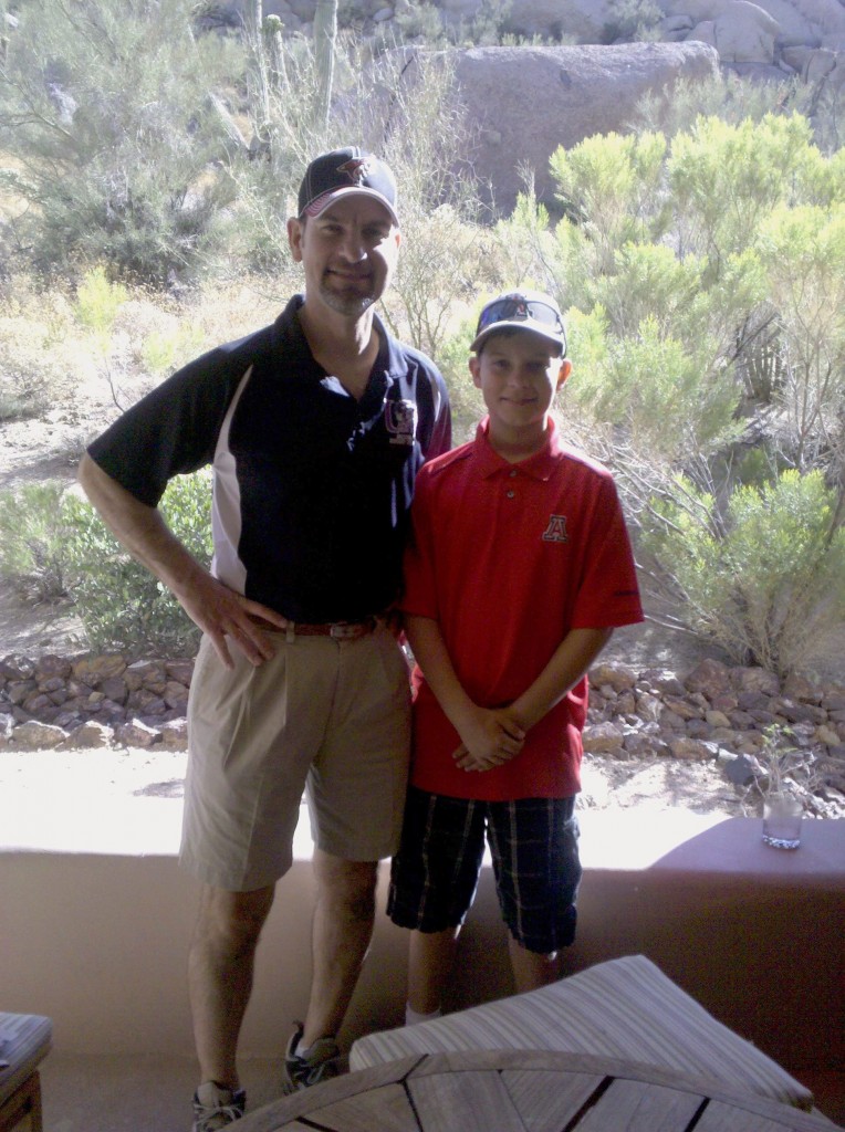 This was taken a few years ago, since my son is now taller than his Dad, at The Phoenician on our room's pretty patio.