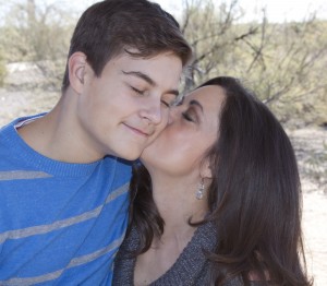 Me and my teenaged boy.  Over a year ago I snuck in a rare kiss during our holiday photo shoot.  